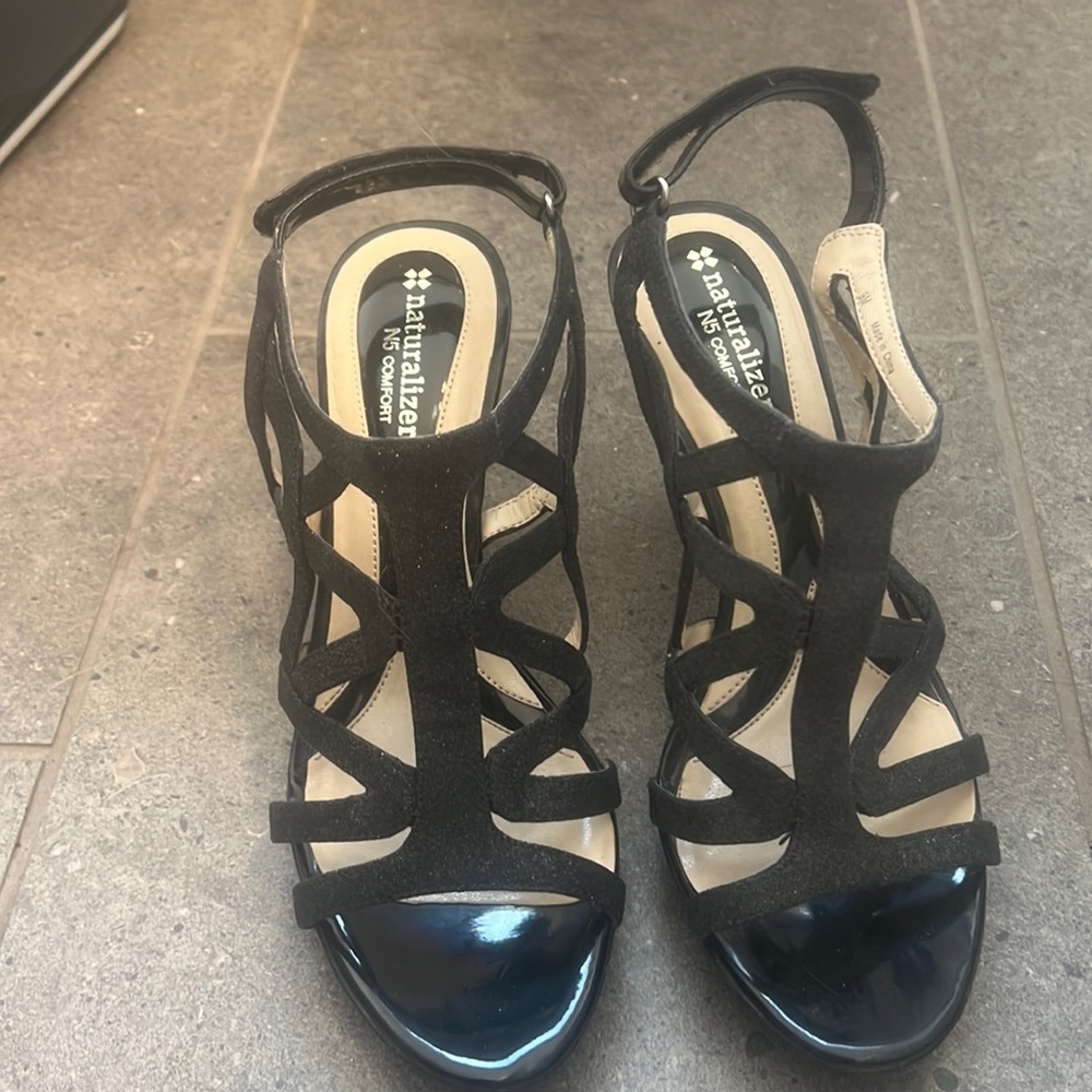 Naturalized strappy comfort heals. Worn a few times like new